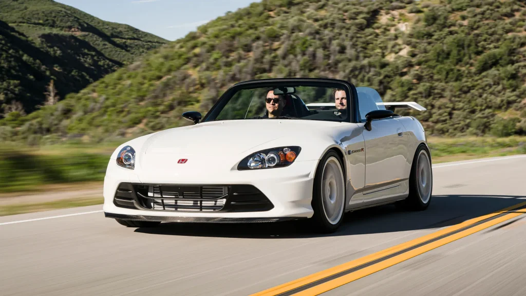 Honda S2000 รถสปอร์ตเปิดประทุนคลาสสิก ขับสนุก เหนือกาลเวลา | ยางรถยนต์ ราคาอัปเดต 2026 ครบทุกยี่ห้อ รวมยาง Ev | Autotirechecking Honda S2000 รถสปอร์ตเปิดประทุนคลาสสิก ขับสนุก เหนือกาลเวลา