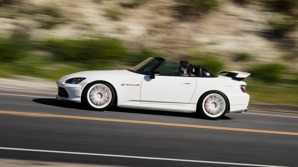 Honda S2000 รถสปอร์ตเปิดประทุนคลาสสิก ขับสนุก เหนือกาลเวลา | ยางรถยนต์ ราคาอัปเดต 2026 ครบทุกยี่ห้อ รวมยาง Ev | Autotirechecking Honda S2000 รถสปอร์ตเปิดประทุนคลาสสิก ขับสนุก เหนือกาลเวลา