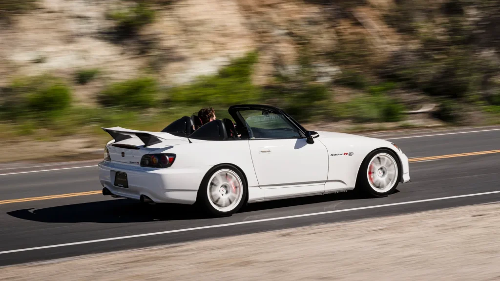 Honda S2000 รถสปอร์ตเปิดประทุนคลาสสิก ขับสนุก เหนือกาลเวลา | ยางรถยนต์ ราคาอัปเดต 2026 ครบทุกยี่ห้อ รวมยาง Ev | Autotirechecking Honda S2000 รถสปอร์ตเปิดประทุนคลาสสิก ขับสนุก เหนือกาลเวลา