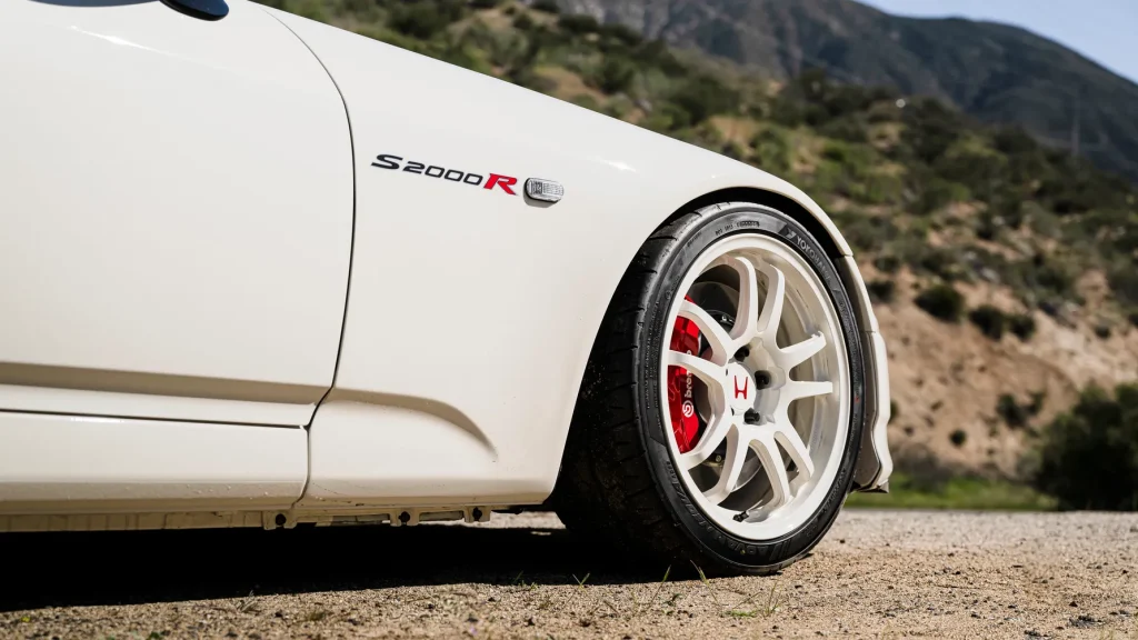 Honda S2000 รถสปอร์ตเปิดประทุนคลาสสิก ขับสนุก เหนือกาลเวลา | ยางรถยนต์ ราคาอัปเดต 2026 ครบทุกยี่ห้อ รวมยาง Ev | Autotirechecking Honda S2000 รถสปอร์ตเปิดประทุนคลาสสิก ขับสนุก เหนือกาลเวลา