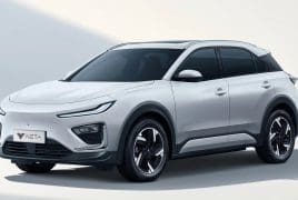 White compact SUV parked at an angle, sleek design with black-tinted windows and alloy wheels (NETA).