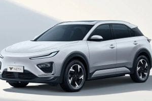 White compact SUV parked at an angle, sleek design with black-tinted windows and alloy wheels (NETA).