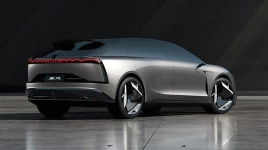 Img3202 | ยางรถยนต์ ราคาอัปเดต 2026 ครบทุกยี่ห้อ รวมยาง Ev | Autotirechecking Rear three-quarter view of a silver futuristic concept car on a reflective tile surface with seamless design.