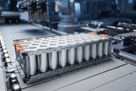 Industrial battery pack with cylindrical cells on a factory conveyor line on an assembly floor