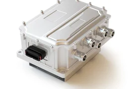 Rugged automotive electronic control unit (ECU) with multiple circular connectors on the side and a black power connector on the front.