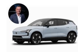 Light-blue electric SUV with a black roof shown in profile; circular inset photo of a smiling man in a suit at the top-left.
