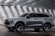 Side view of a gray SUV in motion on a road, with promotional text 'The New MU-X Phantom' in the top-left corner.